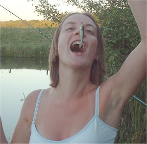 Lisa demonstrates the second part of the traditional fishing chant
